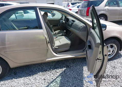 2005 Toyota Camry Le z USA, uszkodzony, nr VIN 4T1BE32K85U080394
